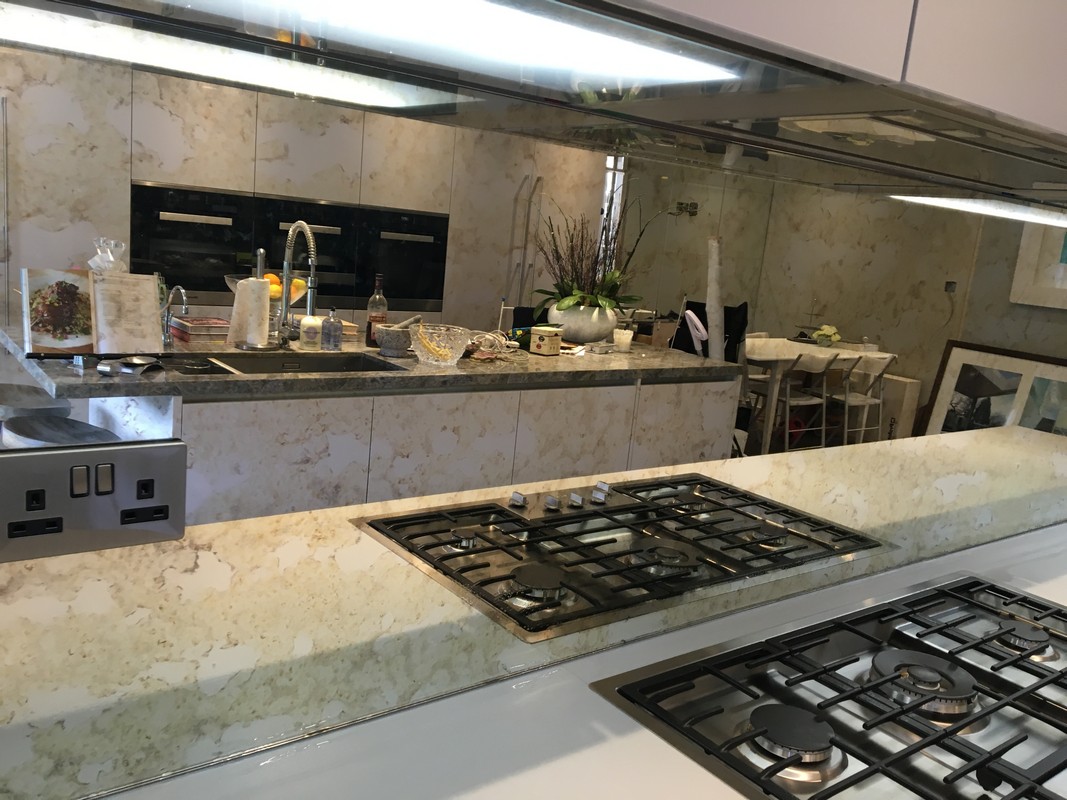 Mirror glass splashback in Walworth luxury kitchen
